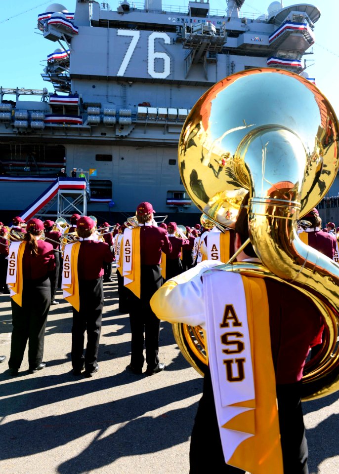 Arizona State University marching band performs in front of USS Ronald Reagan 131229-N-AV746-602