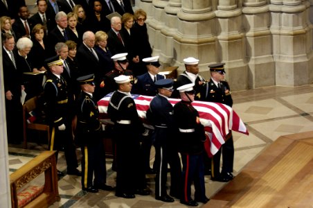 Armed Forces body bearers carry the casket of President Gerald R. Ford