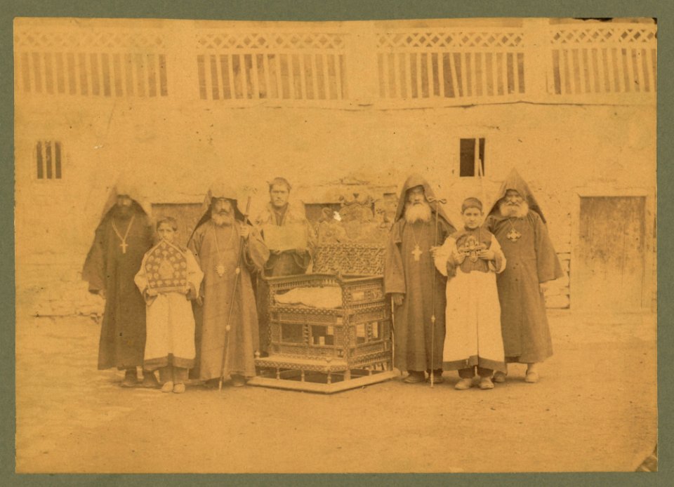 Armenian monks and boys with throne of King Senekerim-Hovhannes of Vaspurakan, at Varagavank Monastery, Van, Turkey LCCN2004671950
