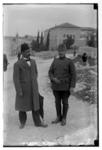 Arrival of Turkish plane. Mayor of Jerusalem & Turkish officer. Hussein Selim el-Hussein(i), American Colony in background LOC matpc.07438
