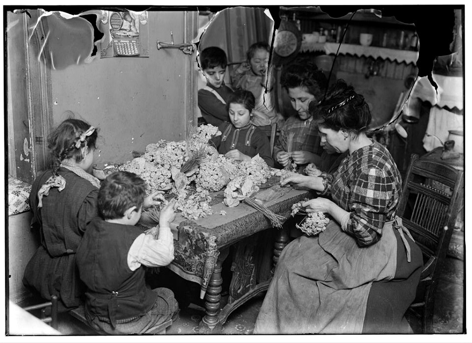 Artificial flower making at 8 cents a gross. Youngest child working is 5 years old. LOC cph.3a27326