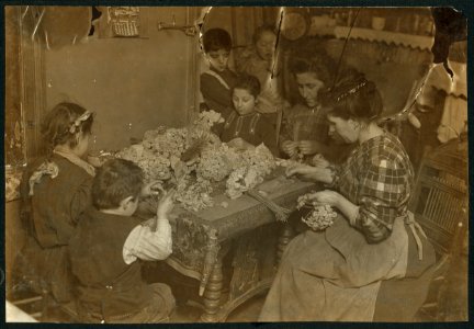 Artificial flower making at 8 cents a gross. Youngest child working is 5 years old. LOC cph.3a27326