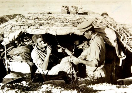 Artillery officer directing gunfire from a control post, 8th Army, WWII (36845599640)