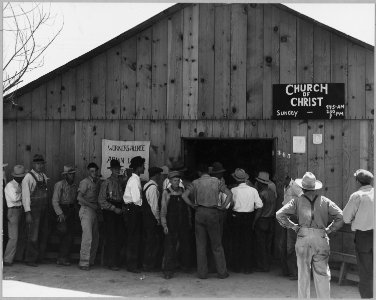 Arvin, Kern County, California. Line up for state relief pay day. Shows exterior of building. This b . . . - NARA - 521650