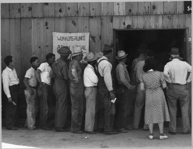 Arvin, Kern County, California. Line up for state relief pay day. Shows exterior of building. This b . . . - NARA - 521651