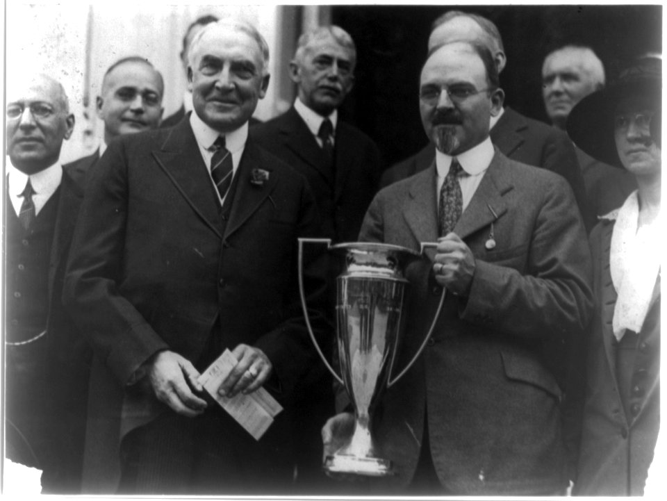 As Honorary Vice President of the National Tuberculosis Assn., President Harding presented to Dr. Frank Ballou, Supt. of Schools, the cup offered for the schools having the largest LCCN2002697238