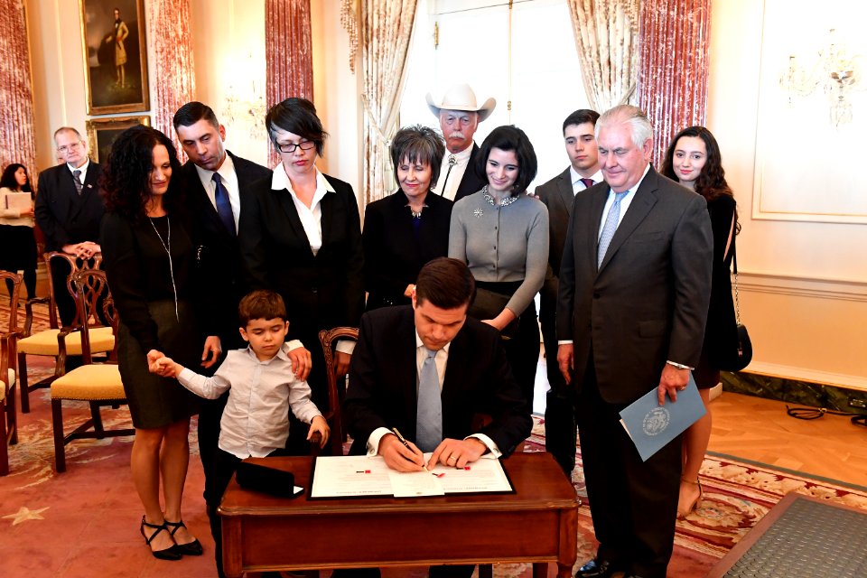 Assistant Secretary Mitchell Signs His Appointment Papers After Being Sworn-In