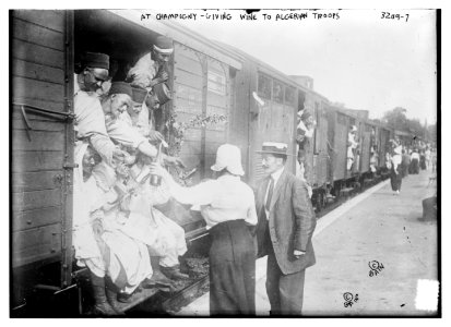 At Champigny - giving wine to Algerian troops LCCN2014697198