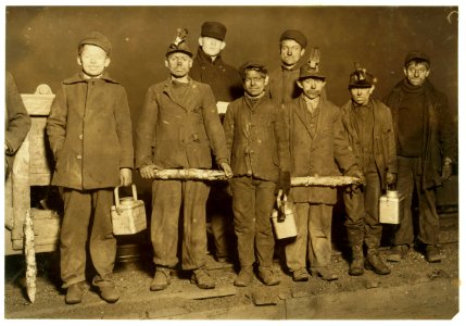 At the close of the day. Just up from the shaft. All work below ground in aPennsylvania Coal Mine. Smallest boy, next to right hand end is a nipper. On his right is Arthur, a driver, Jo on LOC cph.3a24706