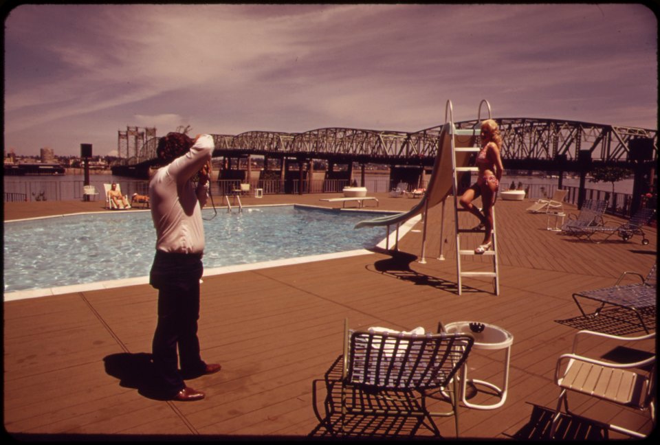 At-the-thunderbird-motel-one-of-many-new-businesses-that-have-sprung-up-along-the-banks-of-the-columbia-river-in-the-background-is-the-interstate-bridge-051973 4272334476 o