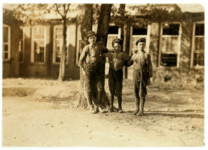 Atherton Mill, Doffer boys Charlotte, N .C. Photo taken during absence of Supt. and contrary to his orders. Tallest boy-Lester Blunt. Been in the mill work 2 years. Middle boy-Eb LOC nclc.01567