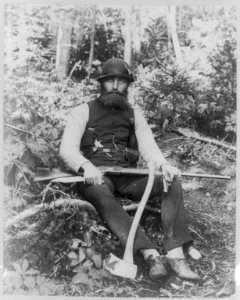 Bearded man armed with ax, rifle, hunting knife, and two pistols, Maine LCCN2002711534