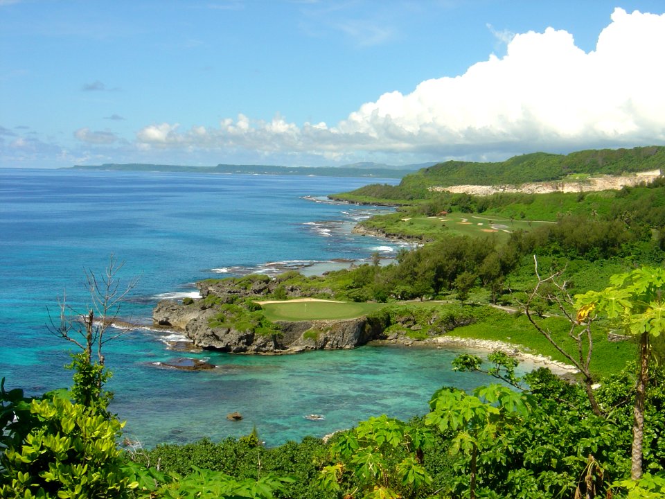 Beautiful coves and turquoise seas adorning the Guam coastline (line380184854)