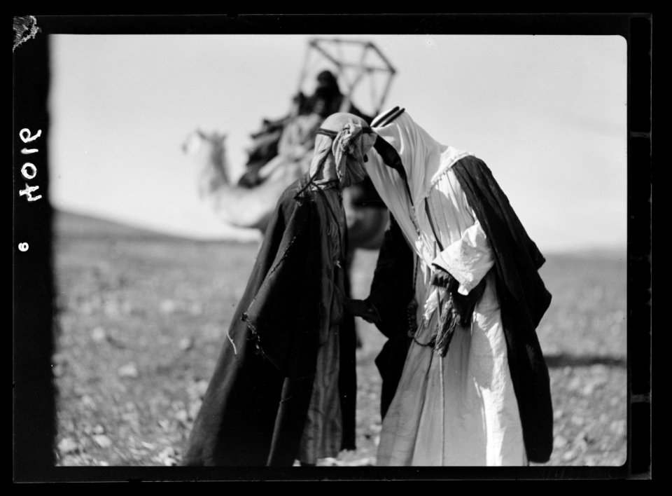Bedouin life in Trans-Jordan. Bedouin greeting. Two men touching foreheads. The usual Bedouin salutation LOC matpc.15667