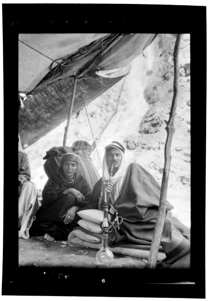 Bedouin life in Trans-Jordan. Semi Bedouin types of Es Salt. Young man and mother at hot springs of Zerka Ma'in LOC matpc.15669