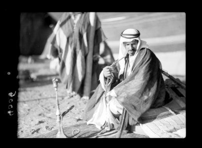 Bedouin life in Trans-Jordan. Sheik Muthgal Pasha. Seated in his tent while camping near Madaba LOC matpc.15660 photo