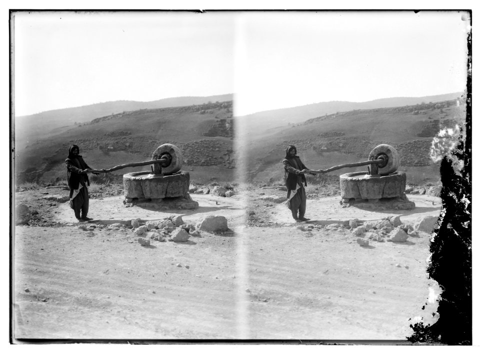Bedouin man at a millstone LOC matpc.04642