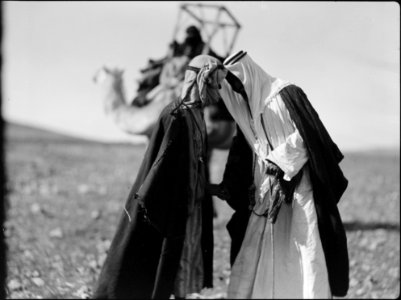 Bedouin life in Trans-Jordan. Bedouin greeting. Two men touching foreheads. The usual Bedouin salutation LOC matpc.15667