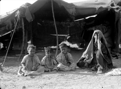 Beersheba and surroundings. (Beer Saba). A Beersheba Bedouin home. Woman and children of the porer class in their tent LOC matpc.15538