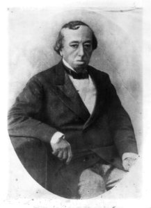 Benjamin Disraeli, three-quarter length, seated, facing right LCCN96505289
