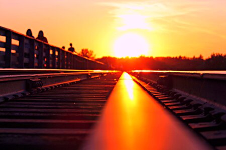 Train line bridge solar eclipse