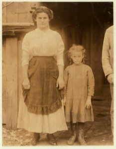 Bertha, a six-year old oyster shucker and her older sister. Father and mother work also. All of them make from $9. to $15. a week. Maggioni Canning Co. LOC nclc.00986