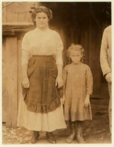 Bertha, a six-year old oyster shucker and her older sister. Father and mother work also. All of them make from $9. to $15. a week. Maggioni Canning Co. LOC nclc.00986 photo