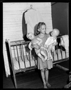 Betty Bryant, daughter of J. F. Bryant, miner, with her dolls. Kingston Pocahontas Coal Company, Warwick Mine, Welch... - NARA - 540729
