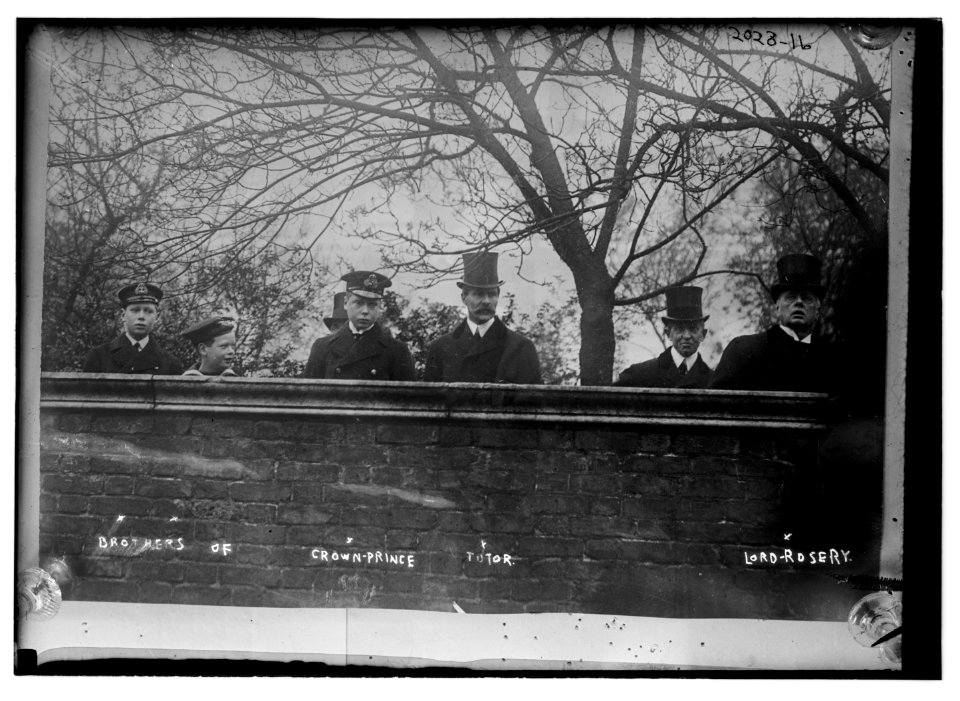 Brothers of Crown Prince Tutor, Lord Rosery. Standing behind a wall. LCCN2014688157