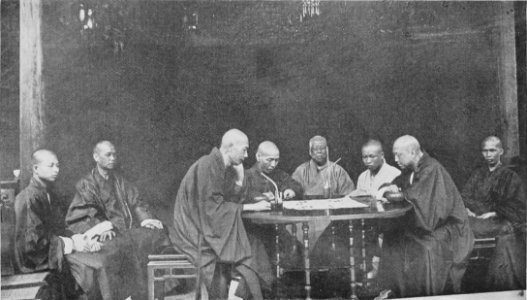 Buddhist Monks at Chess photo
