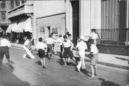 Buenos Aires - Niños jugando al fútbol en la calle photo