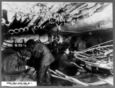 Building sledges between decks on the America LCCN2002736398