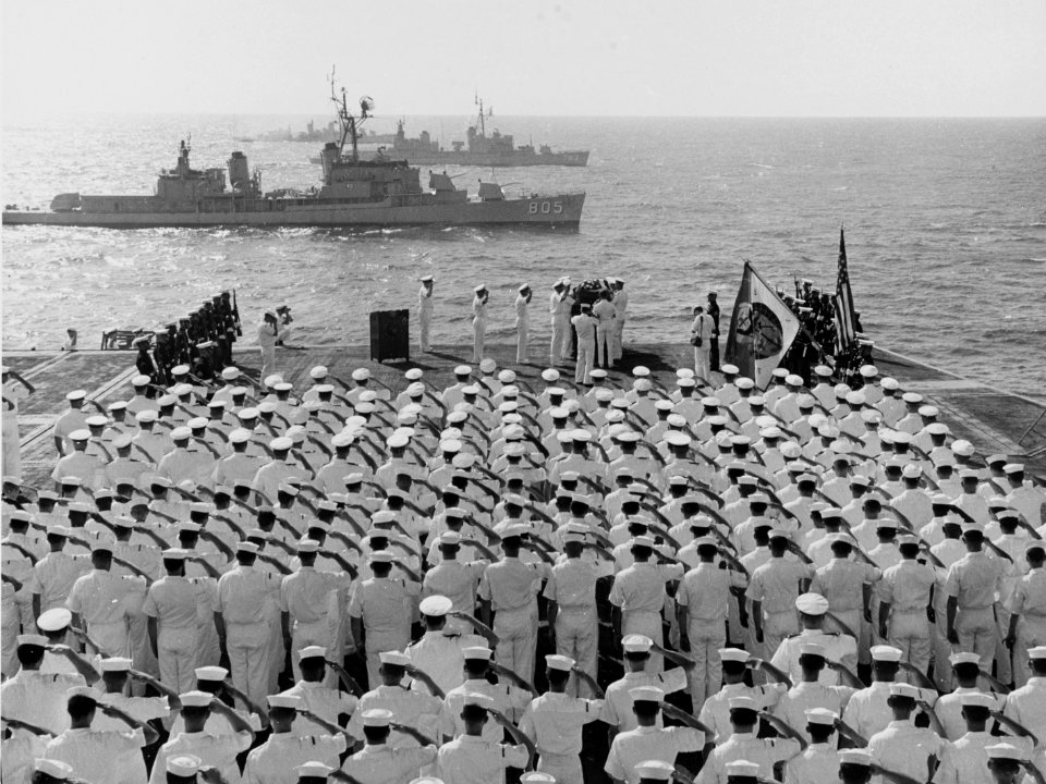 Burial at sea aboard USS Oriskany (CVA-34), 6 November 1966 (NH 97411)