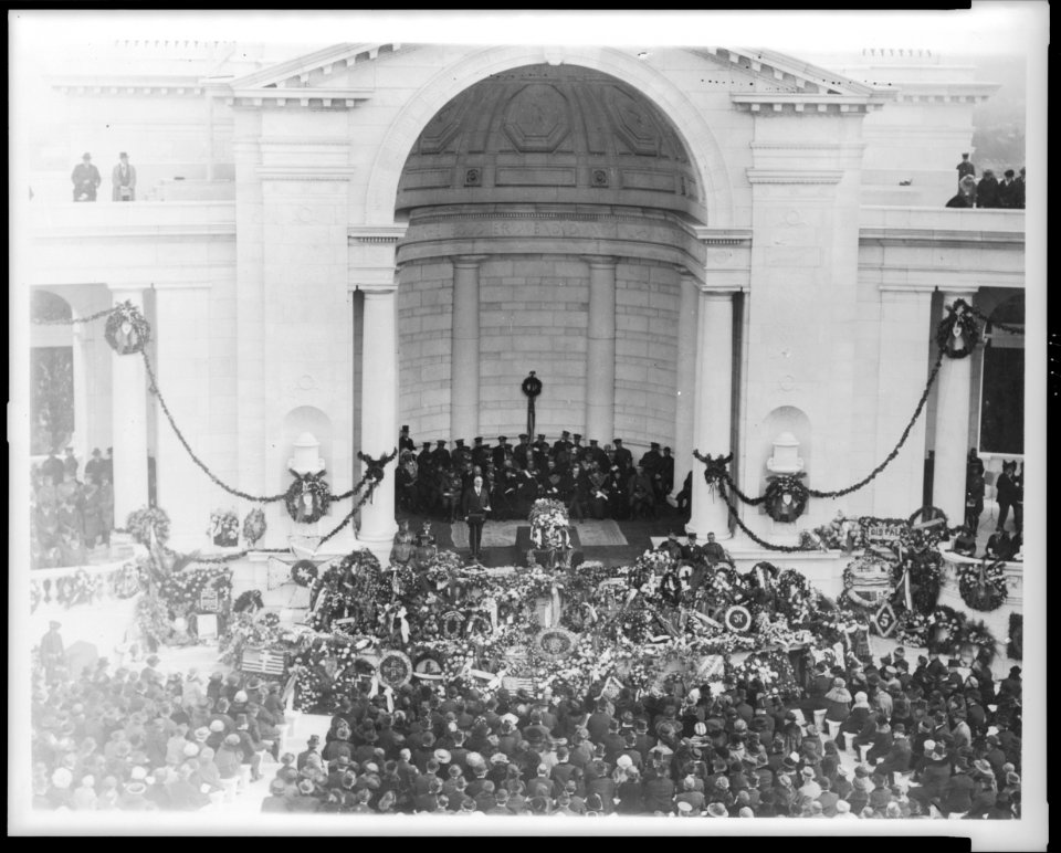 Burial of Unknown Soldier at Arlington National Cemetery, Va.; President Harding standing beside casket, Nov. 11, 1921 LCCN96509696