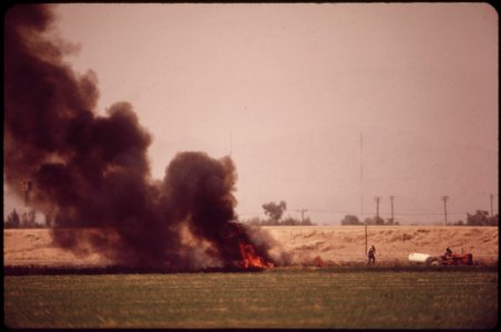 Burning-a-field-near-el-centro-this-is-the-popular-method-for-farmers-who-want-to-start-growing-another-crop-quickly-may-1972 6990413928 o photo
