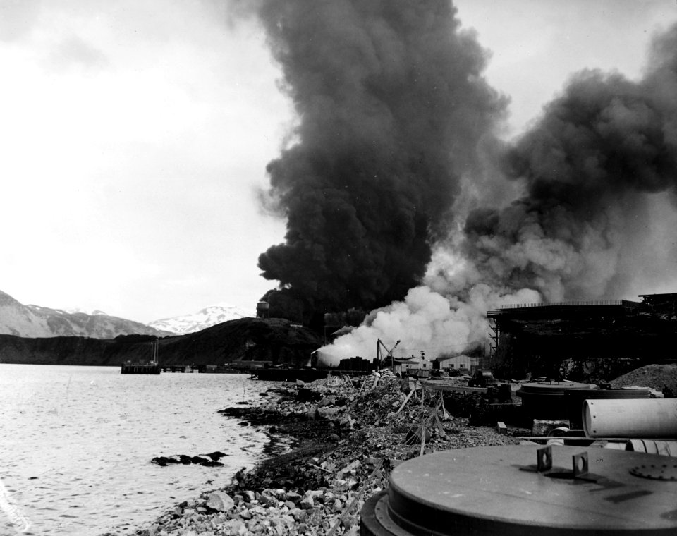 Burning ship and oil tanks at Dutch Harbor 1942