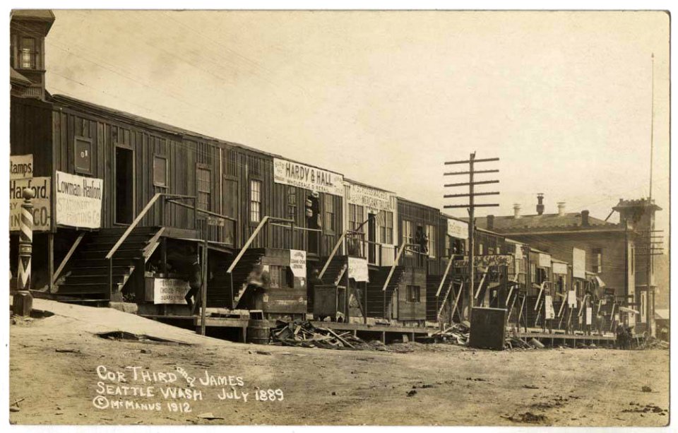 Businesses in temporary buildings near Third Ave and James St after Great Fire, Seattle, July 1889 (MOHAI 11935)