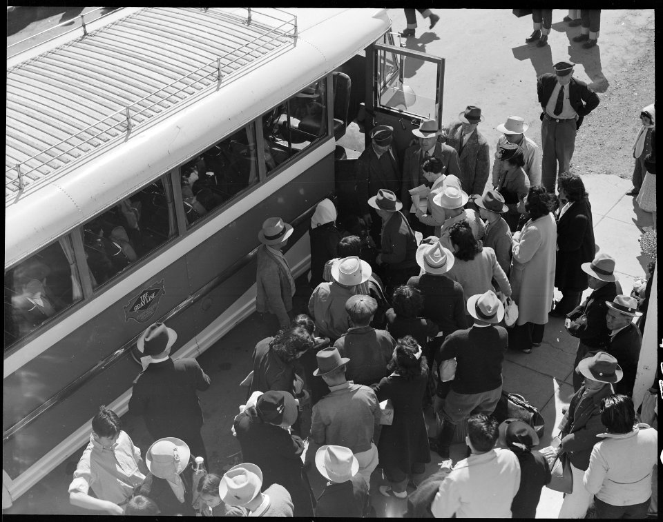 Byron, California. Evacuees of Japanese ancestry boarding a bus for the Turlock Assembly center, si . . . - NARA - 537892