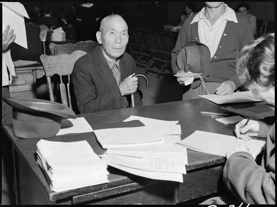 Byron, California. This farmer of Japanese ancestry is being interviewed at the Wartime Civil Contr . . . - NARA - 537699
