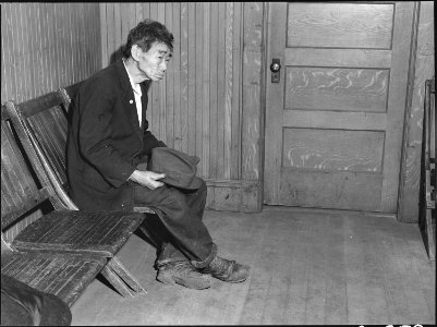 Byron, California. Toshi Mizoguchi waiting at the Wartime Civil Control Administration station to r . . . - NARA - 537693 photo