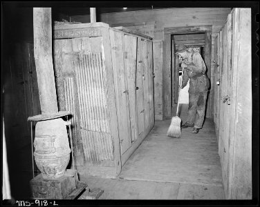 Cleaning up the locker room in the bathouse at the mine. Brilliant Coal Company, Calimet Mine, Parrish, Walker... - NARA - 540608