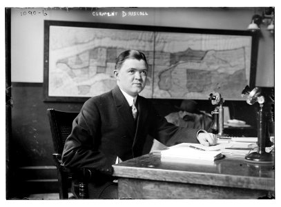 Clement Driscoll seated at desk LCCN2014685345