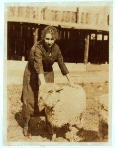 Clementine Miller (and her parents) with her sheep exhibit at the 4 H Club Fair, Charleston, W. Va. LOC nclc.04432