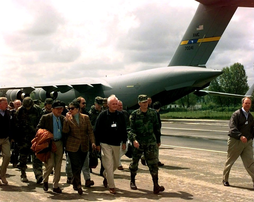 Clifton Bray takes US Congressman and Senators on a tour of the Rinas flight line during their tour in Albania
