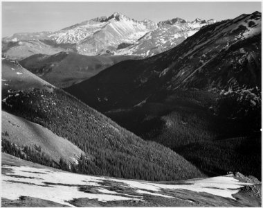 Close in view, dark shadowed hills in foreground, mountains in background, Long's Peak, Rocky Mountain National Park, - NARA - 519963 photo