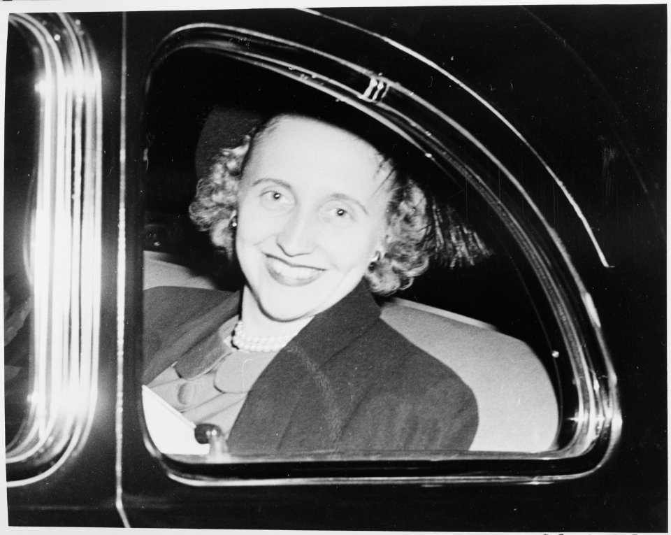 Close-up photograph of Margaret Truman, taken through the side window of an automobile. Miss Truman had just returned... - NARA - 199956