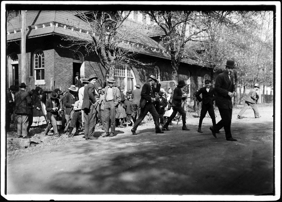 Closing hour, Saturday noon, at Dallas Mill. Every child in photo, so far as I was able to ascertain, works in that... - NARA - 523352