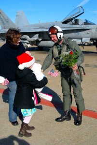 Cmdr. Klaus Ohman Greets Family DVIDS82293