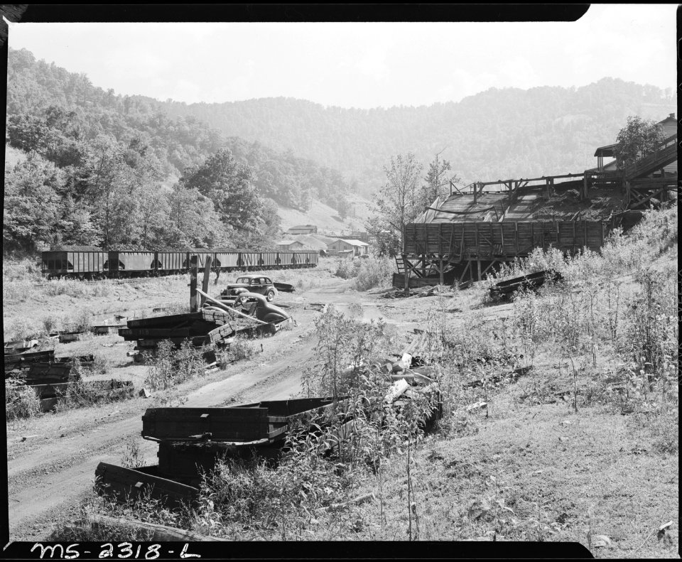 Coal cars below the tipple. Kentucky Straight Creek Coal Company, Belva Mine, abandoned after explosion (in) Dec.... - NARA - 541241