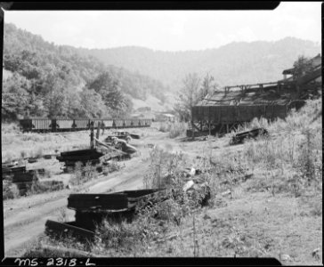Coal cars below the tipple. Kentucky Straight Creek Coal Company, Belva Mine, abandoned after explosion (in) Dec.... - NARA - 541241